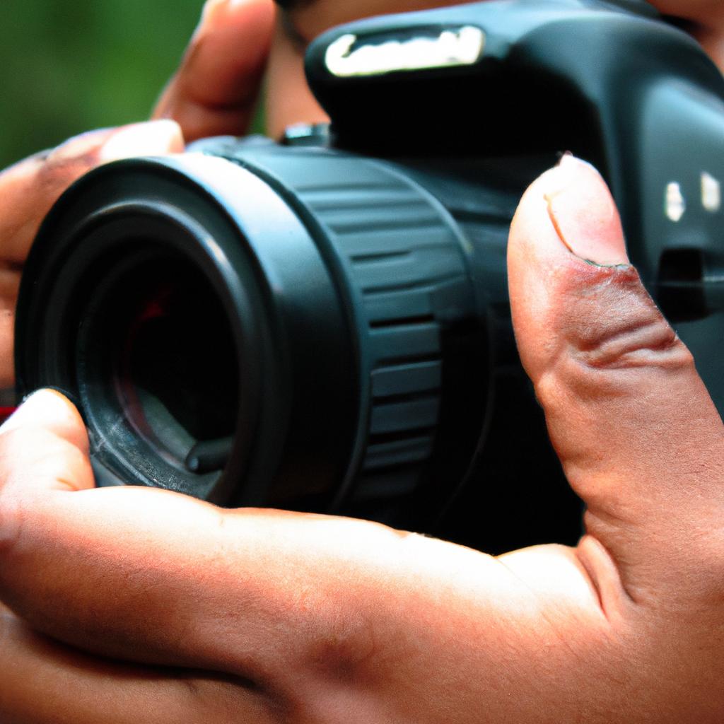 Person holding camera, capturing image